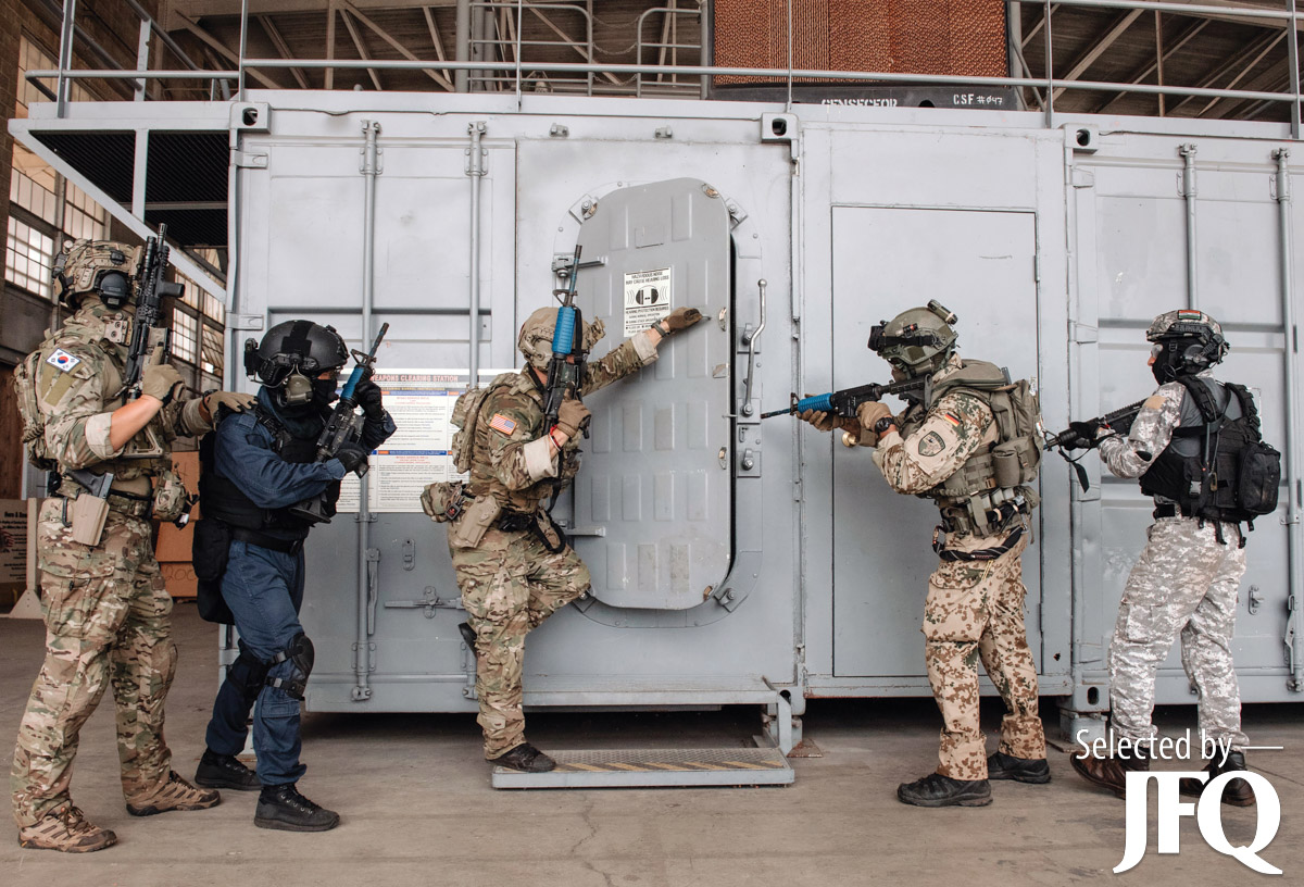 U.S., Indian, Korean, and German special operations forces conduct visit, board, search,
and seizure training