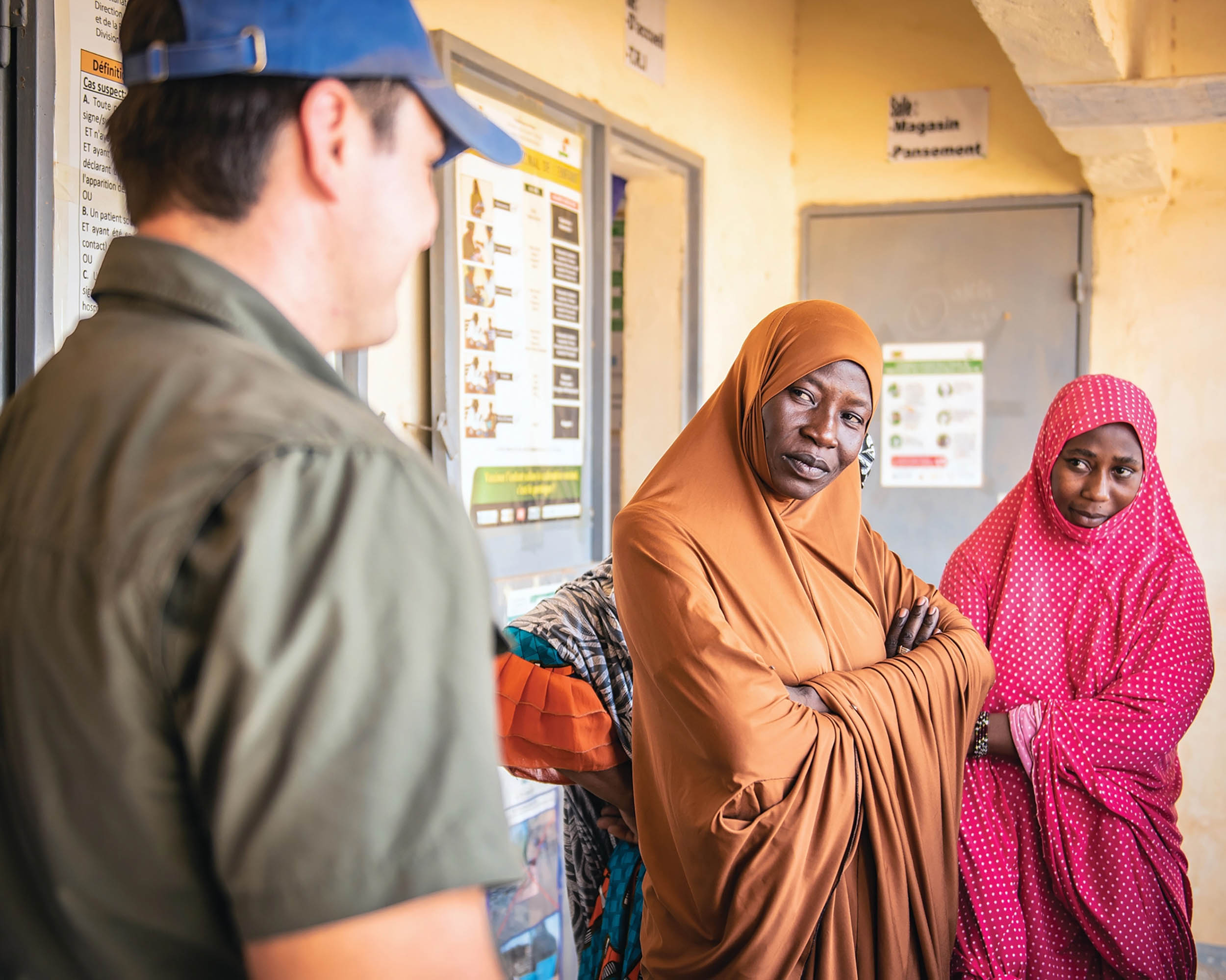 Village nurses from integrated health center discuss village’s medical concerns with Soldiers