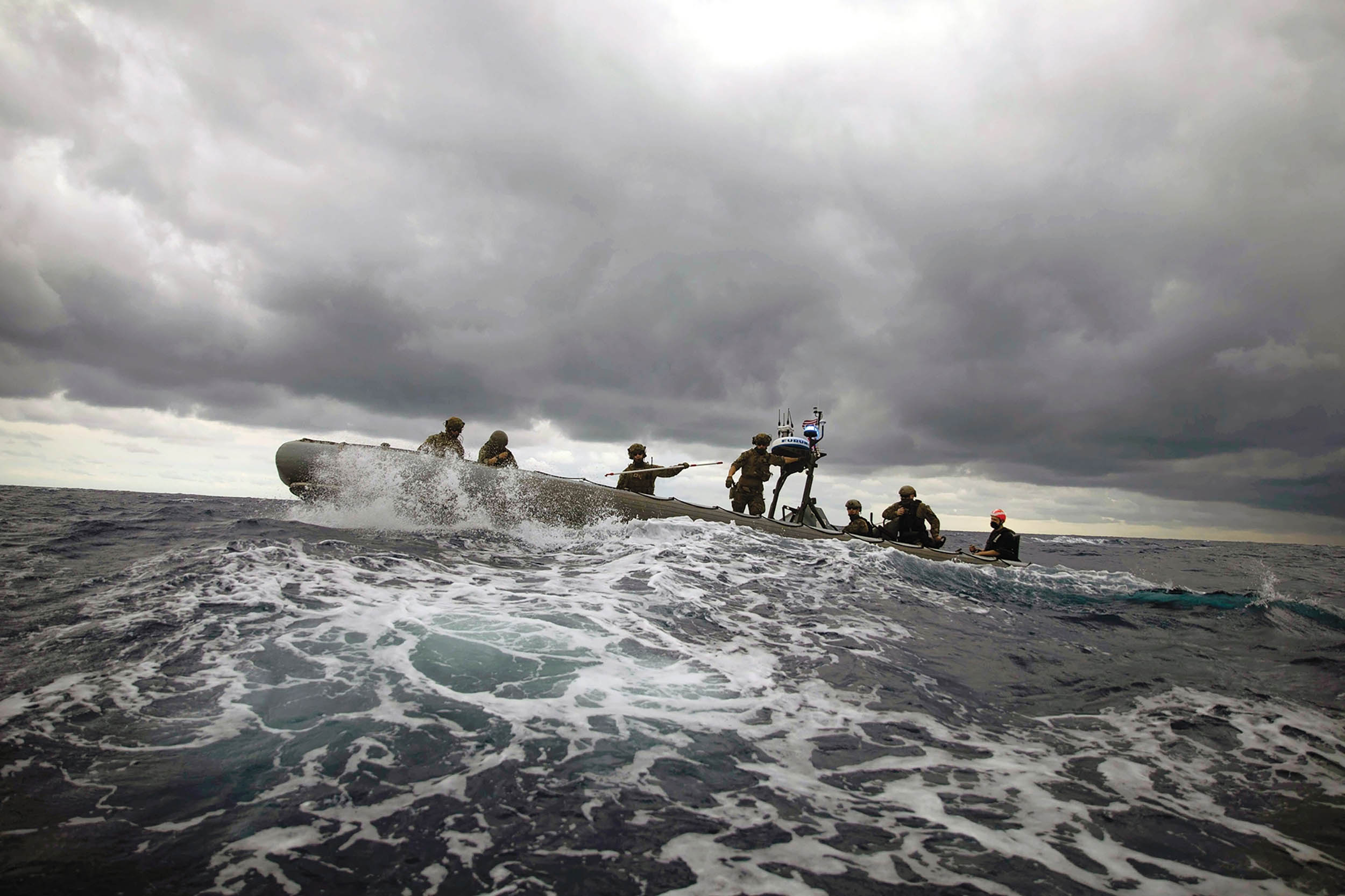 Coast Guardsmen and Sailors participate in noncompliant vessel pursuit tactics exercise