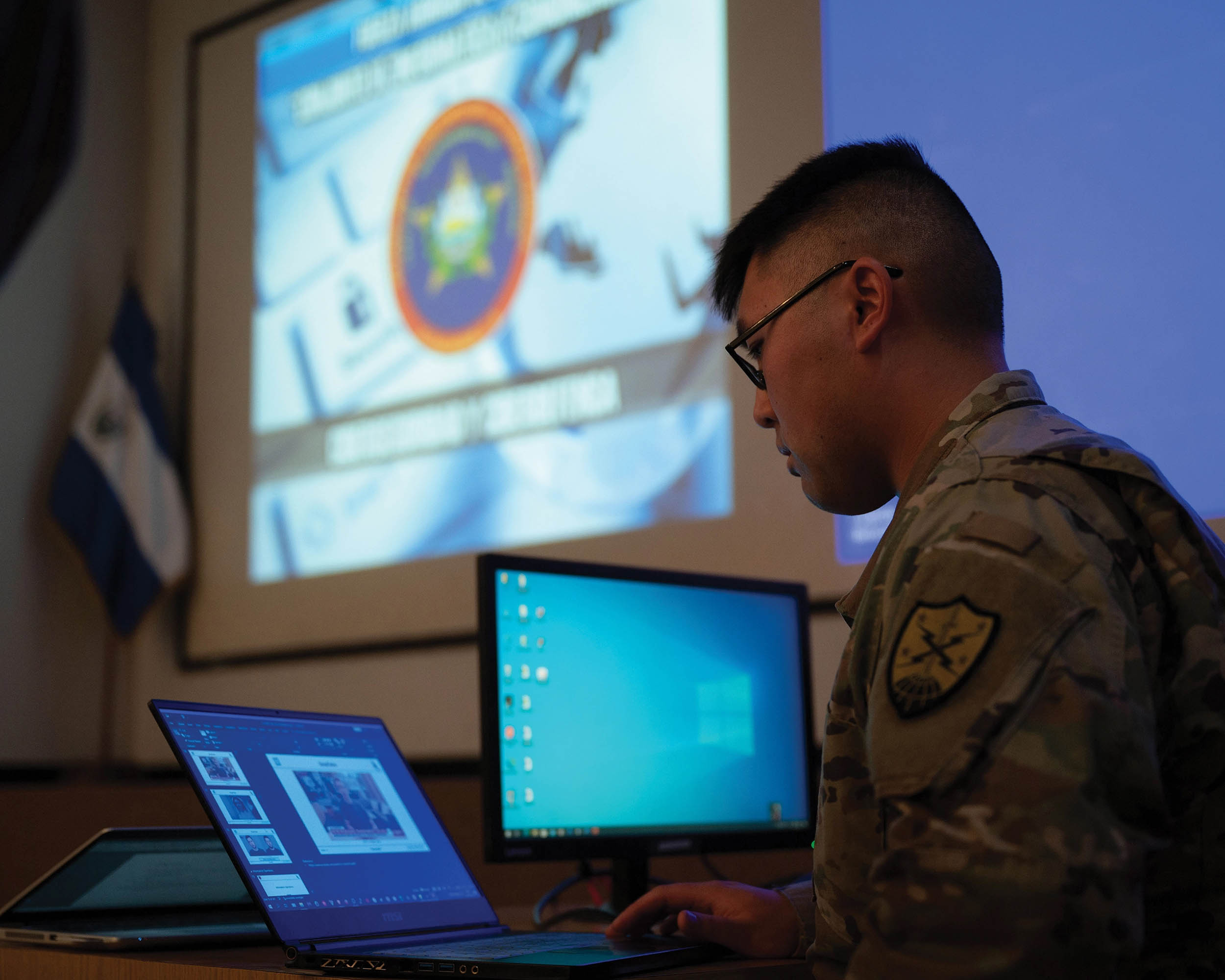 Sergeant Adam Dorian Wong, threat researcher with 136th Cybersecurity Unit, presents new topics of interest including artificial intelligence and vulnerability identification to Salvadoran cyber security unit in El Salvador, December 7, 2022 (U.S. Air National Guard/Victoria Nelson)