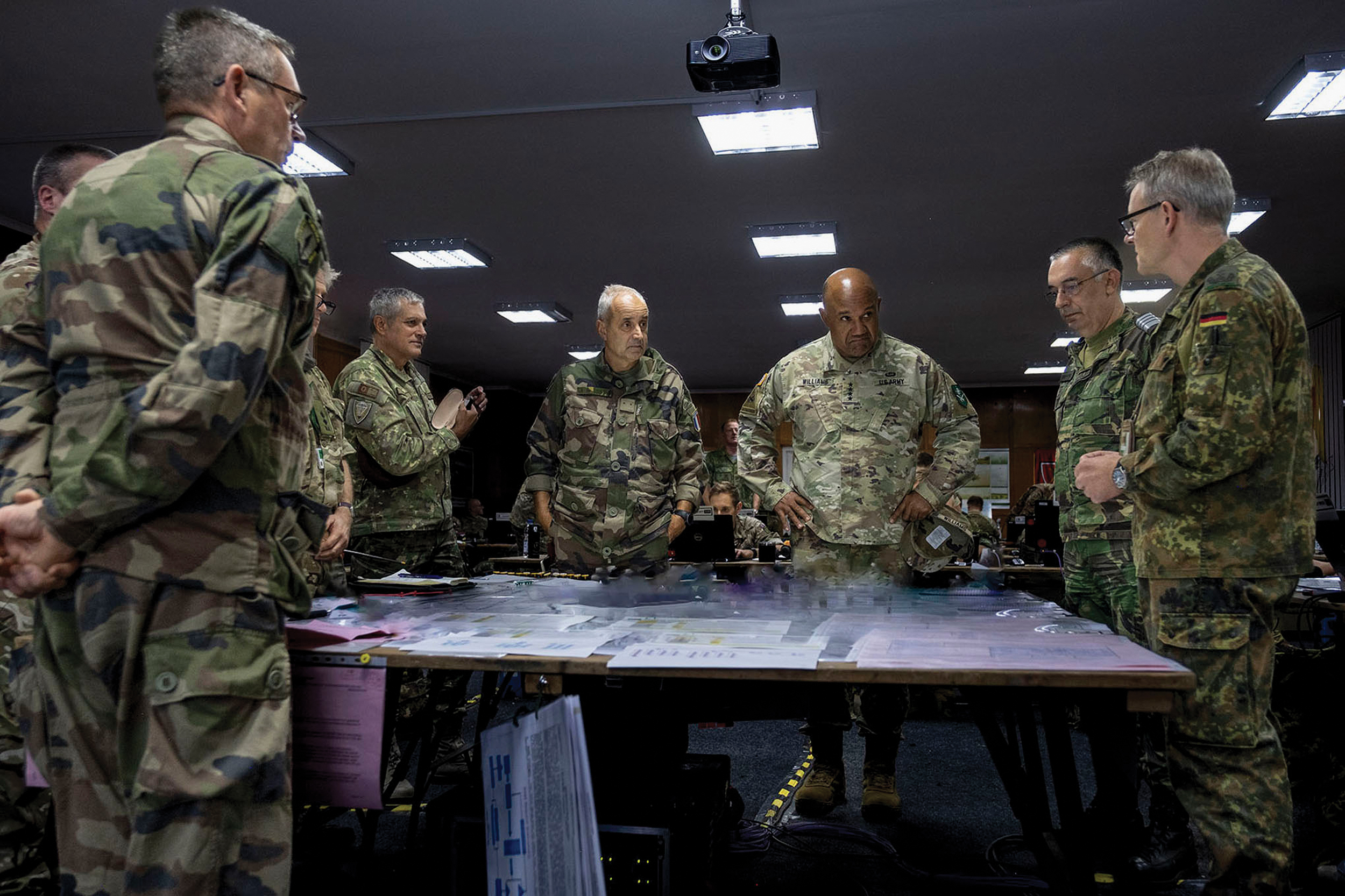 General Darryl Williams, commander of U.S. Army Europe and Africa and commander of NATO’s Allied Land Command, right center, discusses mission command execution with senior officers from NATO HQ Allied Rapid Reaction Corps during Steadfast Jupiter 23