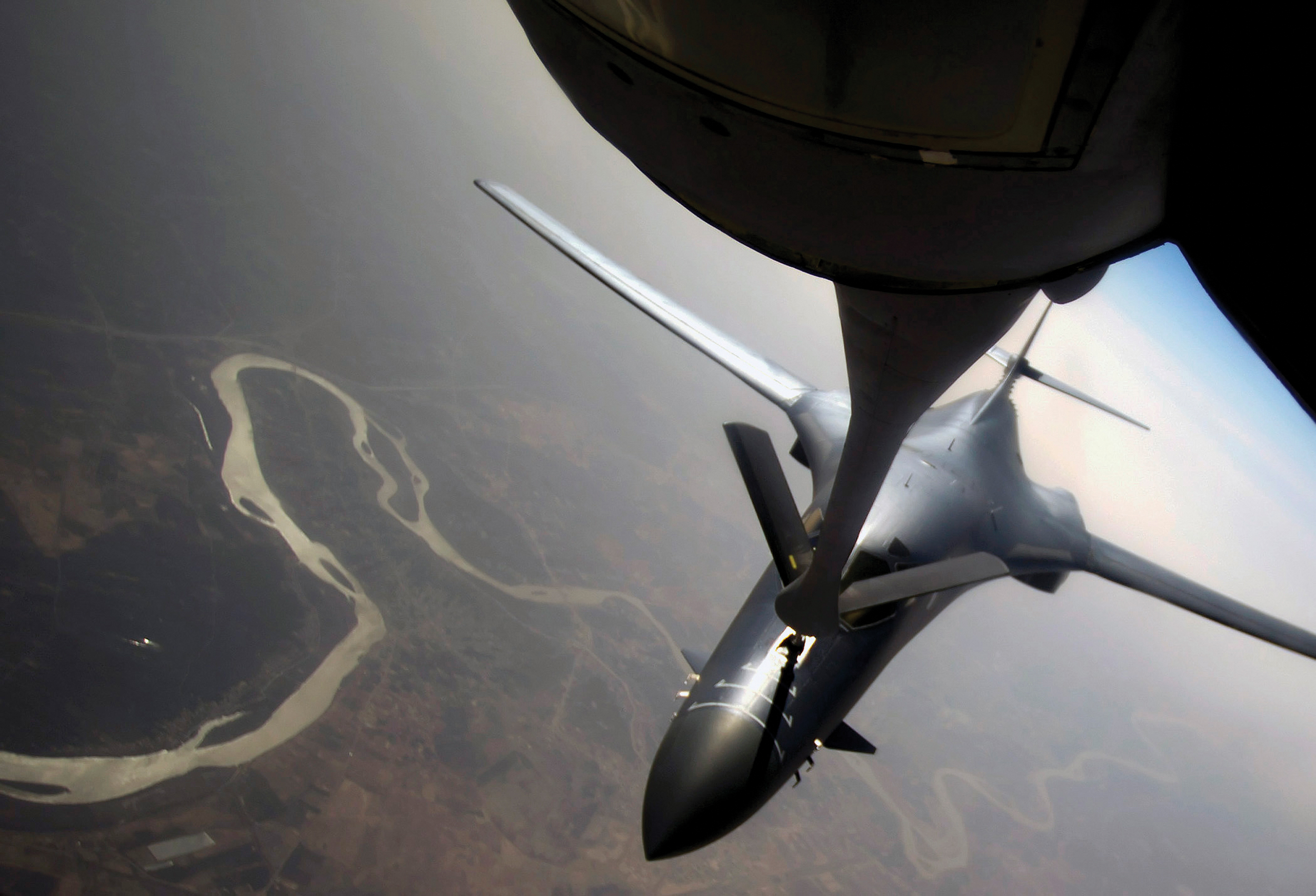 B-1B Lancer is refueled by KC-135 Stratotanker, February 26, 2011, above Iraq, in support of Operation New Dawn