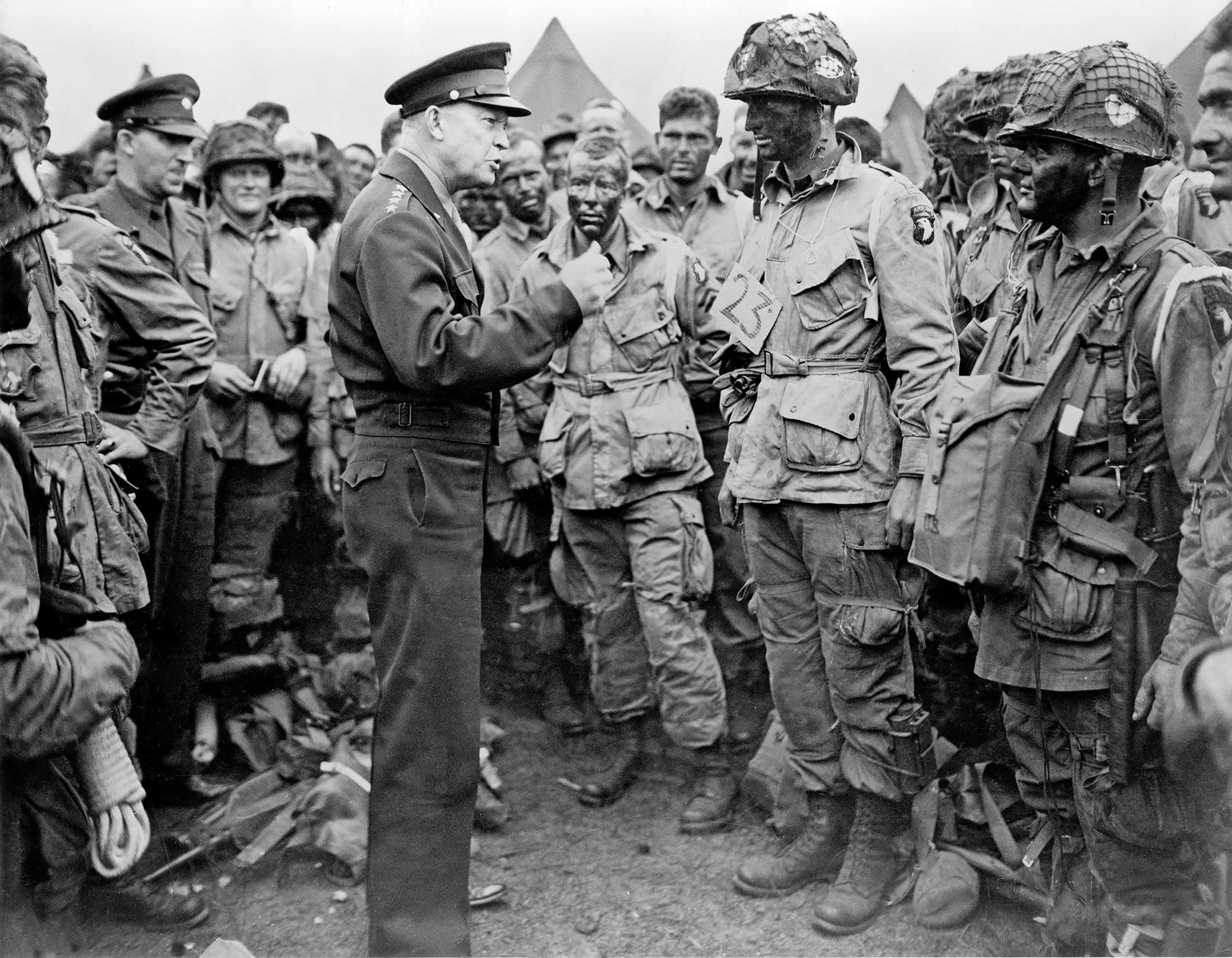 Eisenhower meets with Company E, 502nd Parachute Infantry Regiment (Strike), of 101st Airborne Division, at Royal Air Force Greenham Common, England, about 8:30 p.m., on June 5, 1944, and speaks to, among others, Wallace C. Strobel