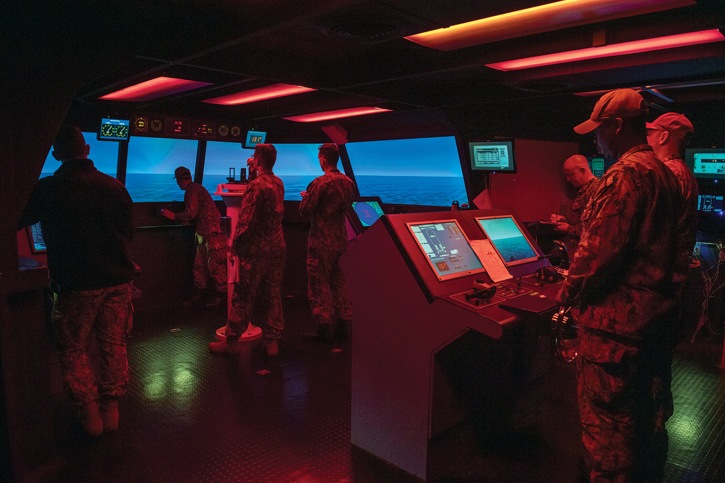 Sailors participate in simulated ship transit while attending Bridge Resource Management course