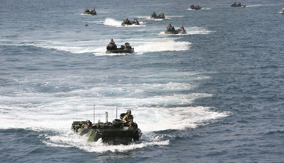 Marine amphibious assault vehicles maneuver back to USS </span><span class='char-style-override-24'>Tortuga</span><span class='char-style-override-23'> at Hat Yao Beach, Krabi Province, Thailand, as part of joint/combined exercise Cobra Gold 2012 (U.S. Marine Corps/Courtney White)