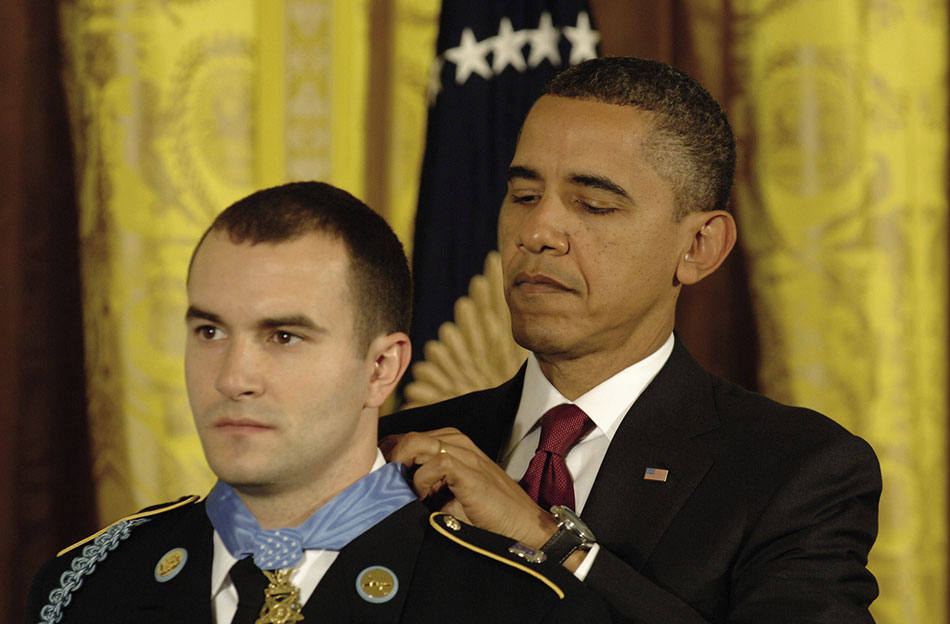 Staff Sergeant Salvatore Giunta, USA, first living recipient of Congressional Medal of Honor since Vietnam War, rescued two members of his squad during insurgent ambush in Afghanistan’s Korengal Valley, October 2007 (U.S. Army/Leroy Council)