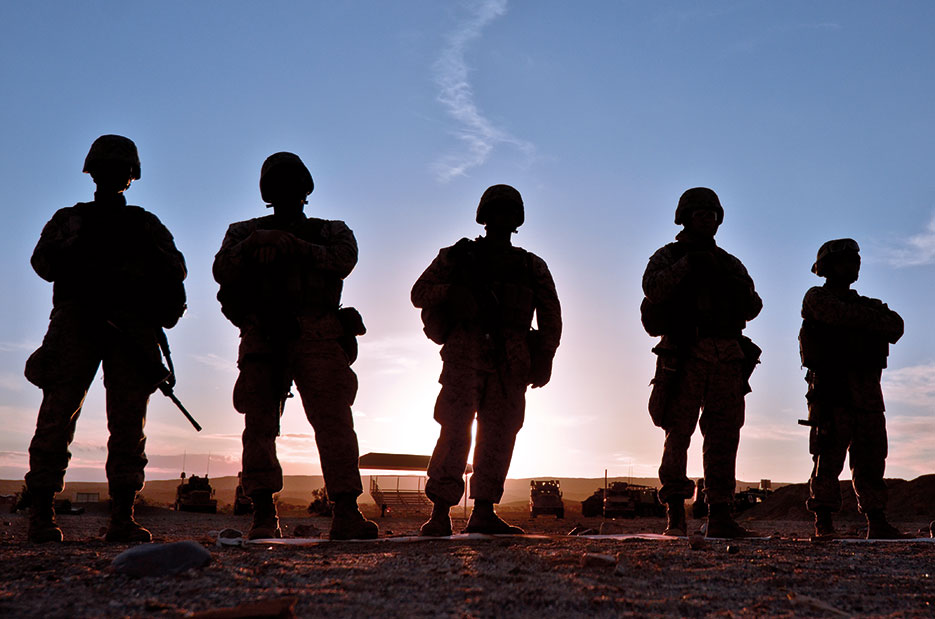 Combat Logistics Battalion 4 Marines stand by for sun to set before beginning night marksmanship shoot (U.S. Marine Corps/Mark Stroud)