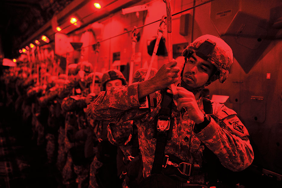 Soldier inspects static line before jumping from C-17 Globemaster III during mission in support of Joint Operations Access Exercise 12-2 (DOD/Eric Harris)