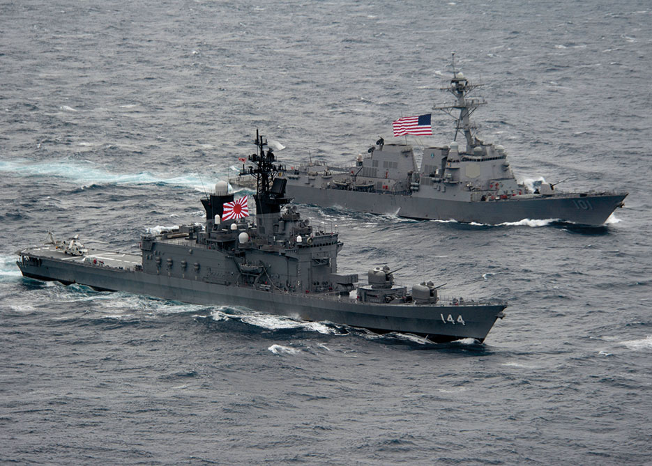 Japan Maritime Self-Defense Force destroyer JS Kurama under way with Arleigh Burke–class guided-missile destroyer USS <i>Gridley</span> during passing exercise (U.S. Navy/James R. Evans)