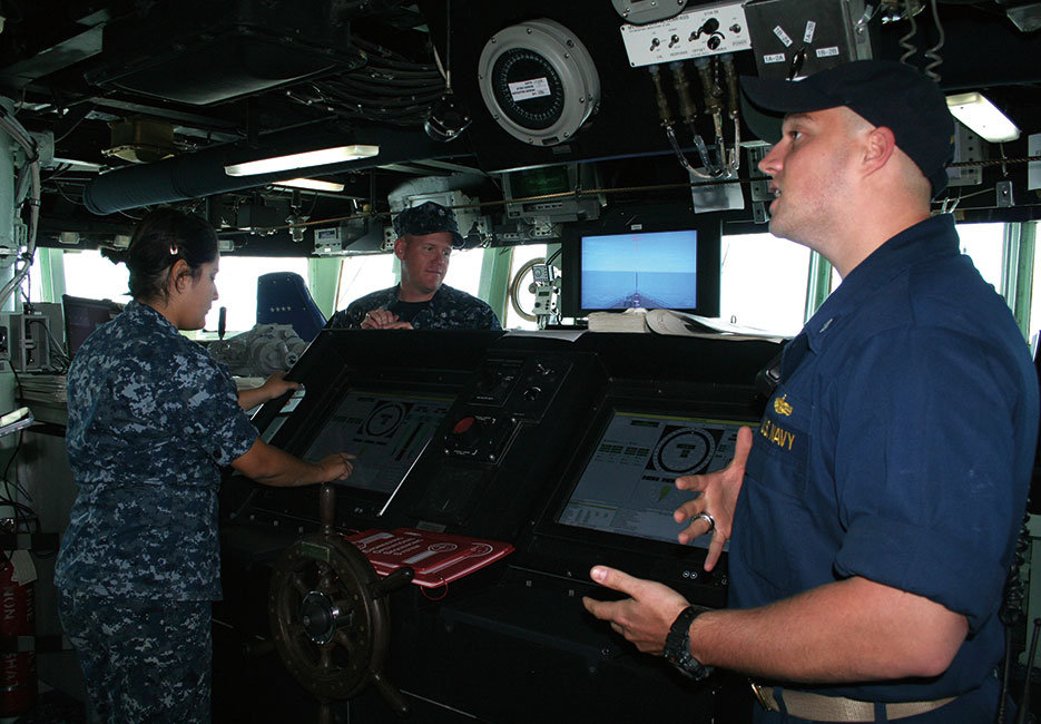 Navy lieutenant (junior grade) describes navigation system aboard USS Arleigh Burke (U.S. Navy/Shelby Wilfong)