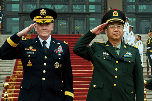 Chairman and PLA Chief of General Staff salute as Chinese troops pass in review in Beijing (DOD/D. Myles Cullen)