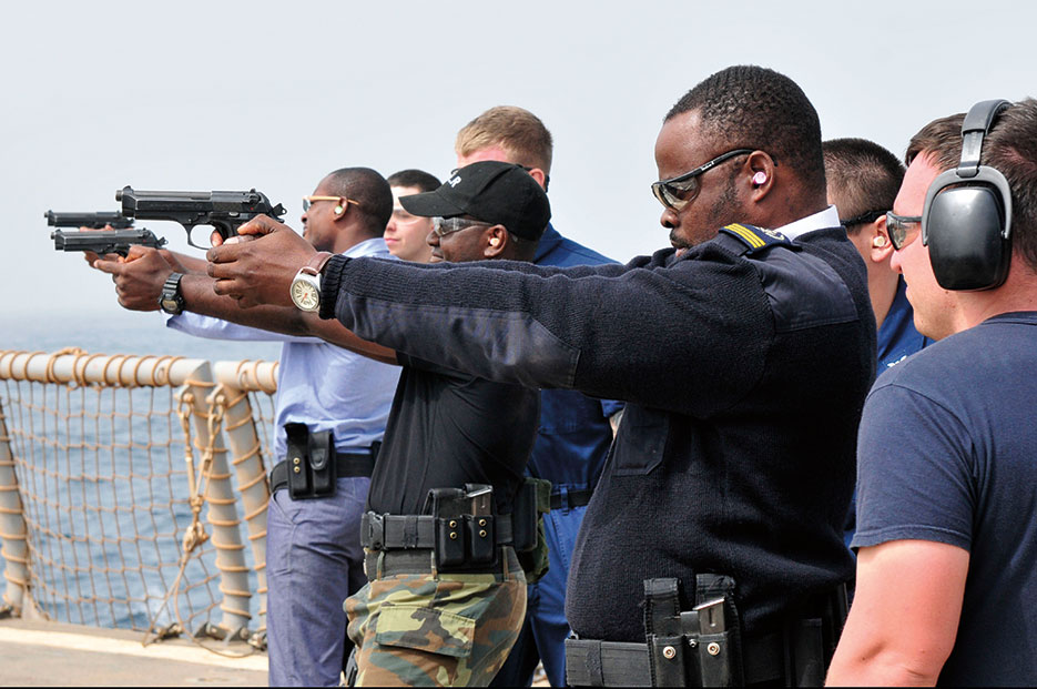 Cameroon, Gabon, and Republic of Congo sailors receive small-arms qualifications training aboard USS Simpson as part of Africa Partnership (U.S. Navy/Felicito Rustique)
