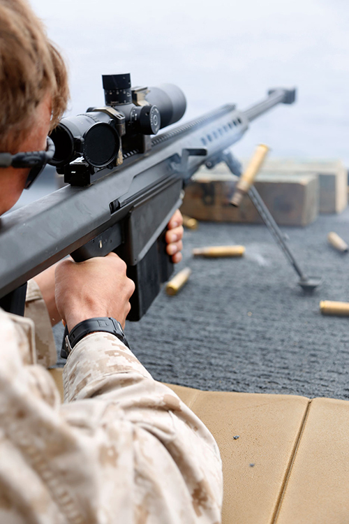 Marine fires M107 special application scope rifle on USS San Diego as part of live-fire familiarization training during Composite Training Unit Exercise off coast of southern California (U.S. Marine Corps/Rome M. Lazarus)