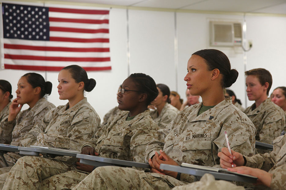 FET Team 11 members in Helmand Province listen to other Marines talk about their deployment experiences (U.S. Marine Corps/Katherine Keleher)