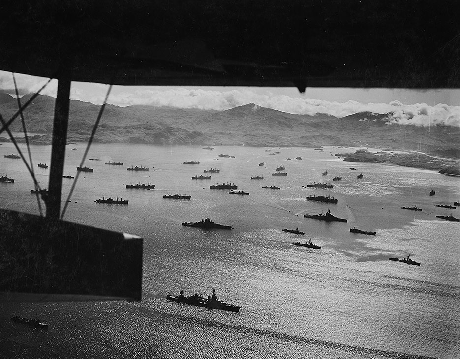 Part of huge U.S. fleet at anchor in Adak Harbor in Aleutians, ready to move against Kiska (NARA/U.S. Army Air Forces/Horace Bristol)