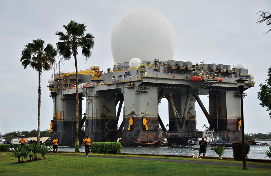 Sea-based X-band radar, world’s largest phased-array X-band radar carried aboard mobile, ocean-going semisubmersible oil platform, transits waters of Joint Base Pearl Harbor–Hickam (U.S. Navy/Daniel Barker)