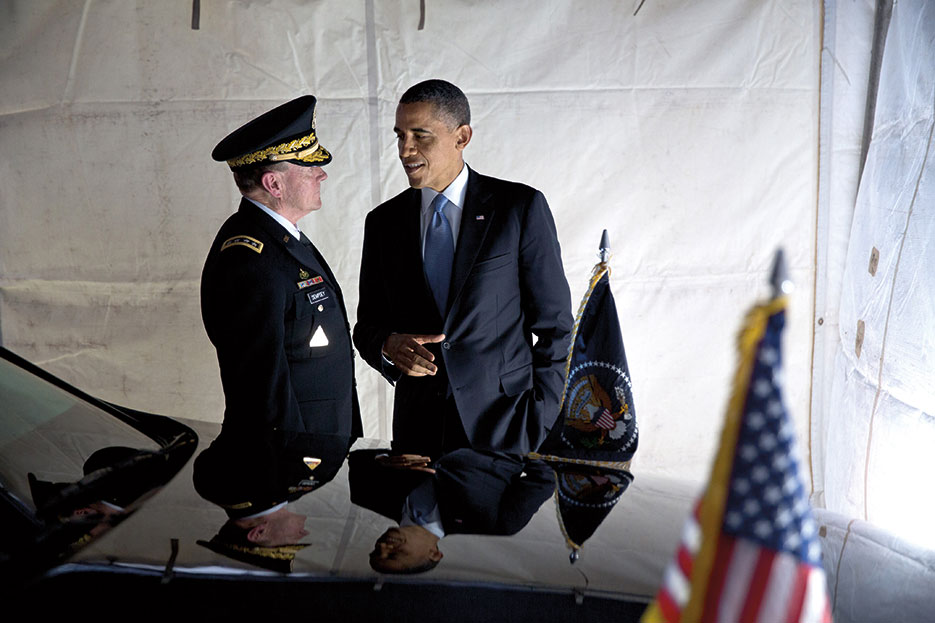 President Obama talks with General Dempsey after attending Armed Forces farewell tribute for Secretary Leon Panetta at Joint Base Myer–Henderson Hall (White House/Pete Souza)