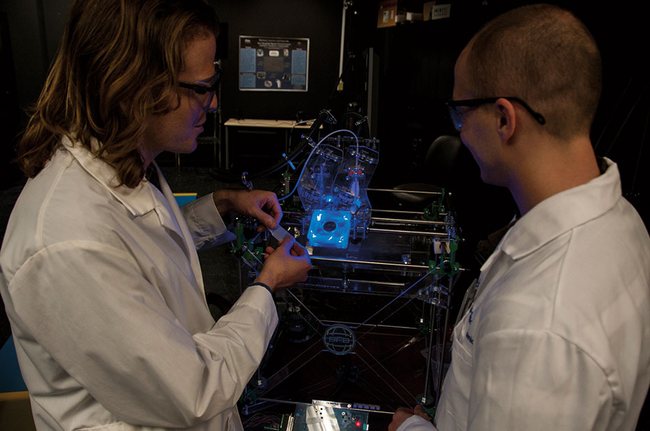 Research engineers use 3-D printer in their work at FDA (FDA/Michael J. Ermarth)