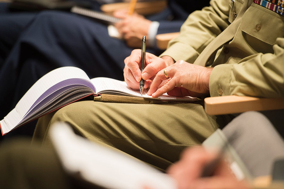 Students listen and take notes as General Dempsey speaks at Keystone course at National Defense University (DOD/Daniel Hinton)