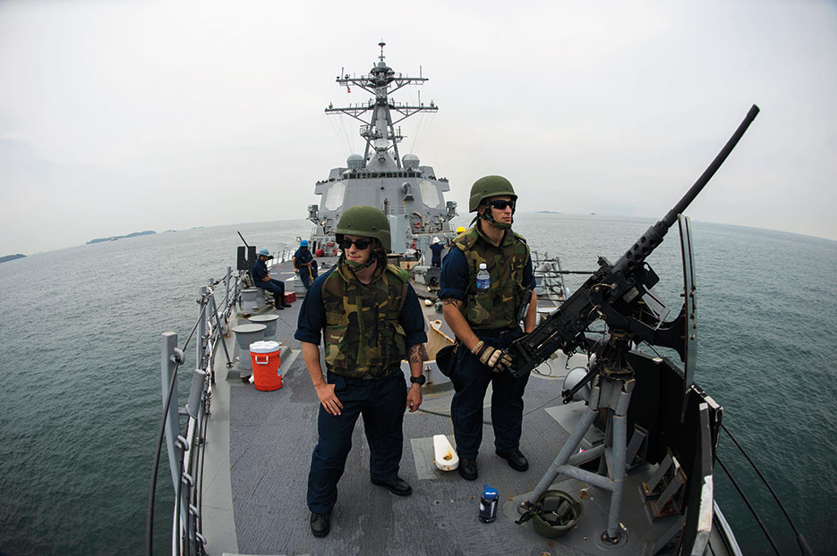 Sailors stand watch on bow of Arleigh Burke–class guided-missile destroyer USS McCampbell as ship enters Straits of Malacca in support of security and stability in Indo-Asia-Pacific region (U.S. Navy/Paul Kelly)