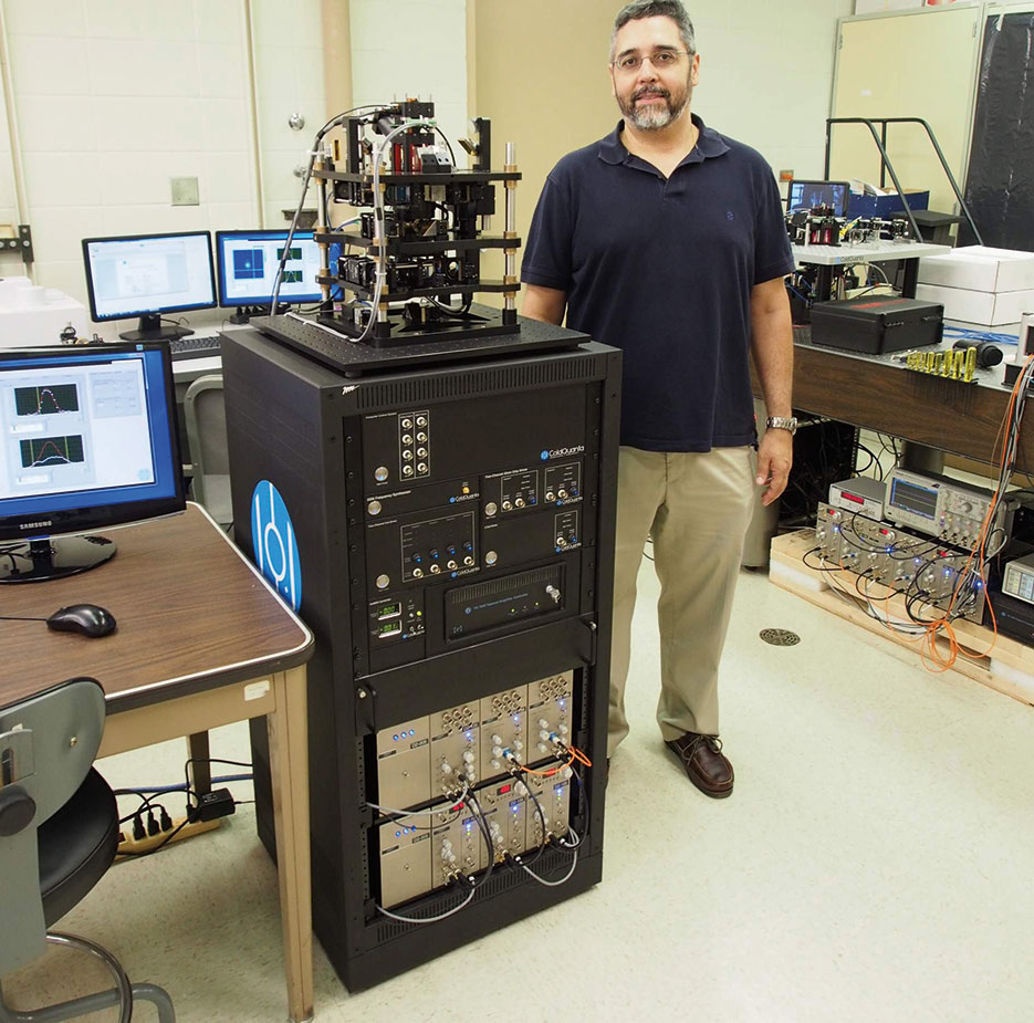 Air Force Research Laboratory Directed Energy Directorate researcher and leader of joint AFRL and University of Hawaii Manoa quantum computing group received two new tabletop quantum computing systems to trap and study behavior of atoms in their condensed, pristine state (U.S. Air Force)