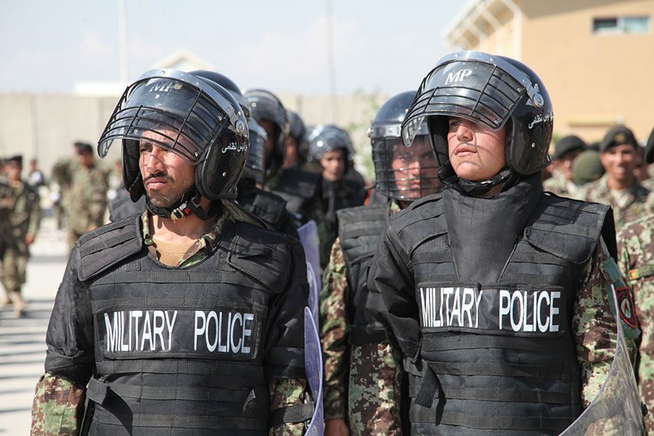 Afghan National Army soldiers stand in formation outside Bagram Air Field as part of ceremony giving Afghan government control of local prison <br />(U.S. Army/Andrew Claire Baker)