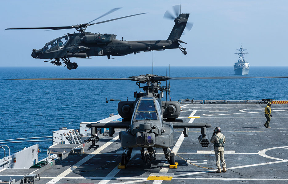 U.S. Army AH-64D Apache helicopter takes off from Afloat Forward Staging Base (Interim) USS <i>Ponce</i> during exercise, November 2012 (U.S. Navy/Jon Rasmussen)