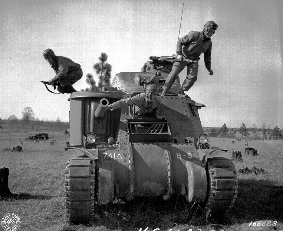Soldiers abandon disabled M-3 tank during Third Army Louisiana Maneuvers at Camp Polk in 1943 (Signal Corps/Calvano)