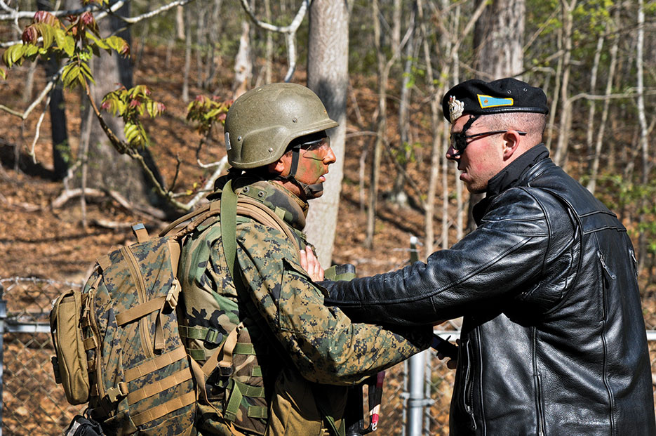 Johns Hopkins University student tries to lower tensions during ethical decisionmaking field exercise at The Basic School (U.S. Marine Corps/Emmanuel Ramos)