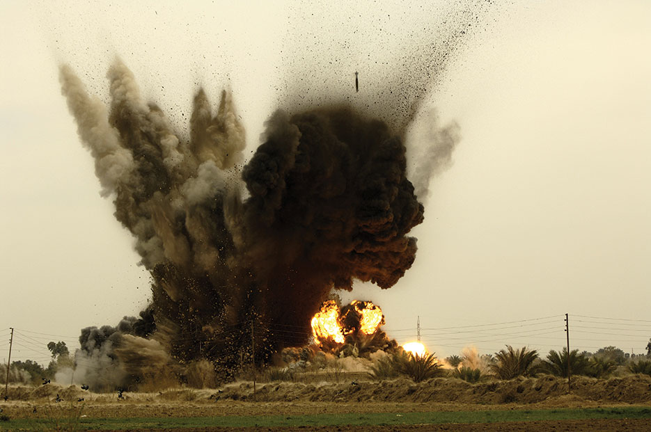 B-1B Lancer aircraft drop six GBU-38 munitions onto insurgent torture house and prison in Northern Zambraniyah, Iraq, March 2008 (U.S. Air Force/Andy Dunaway)