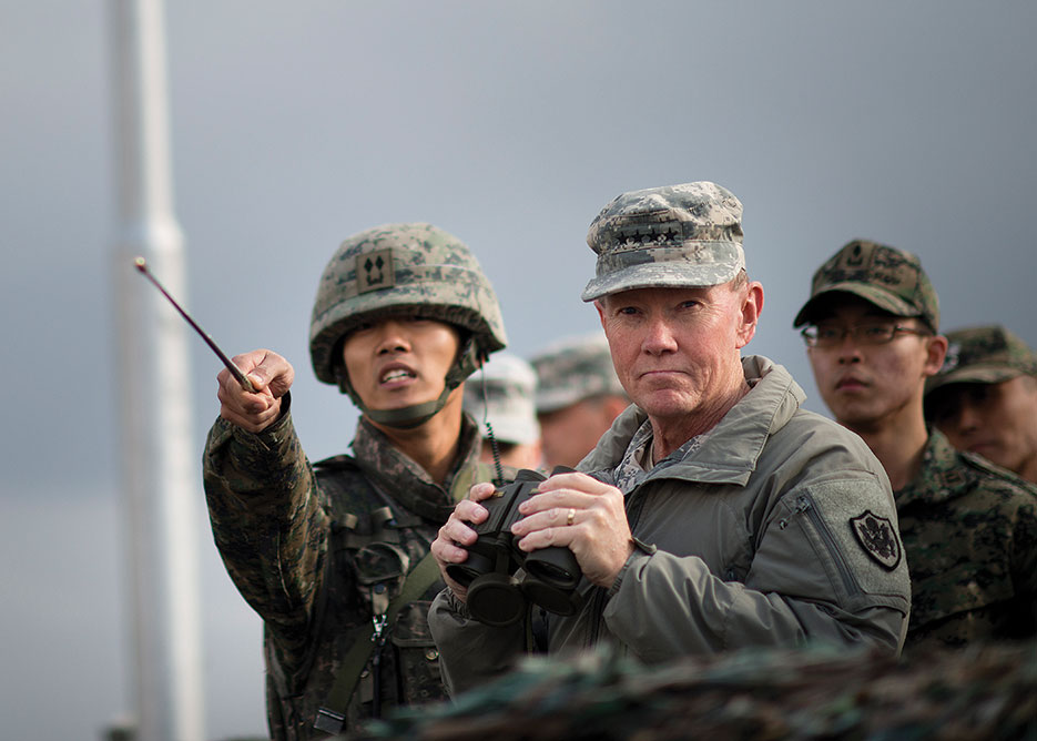 South Korean soldier briefs General Dempsey on points of interest at Demilitarized Zone in South Korea, November 2012 (DOD/D. Myles Cullen)