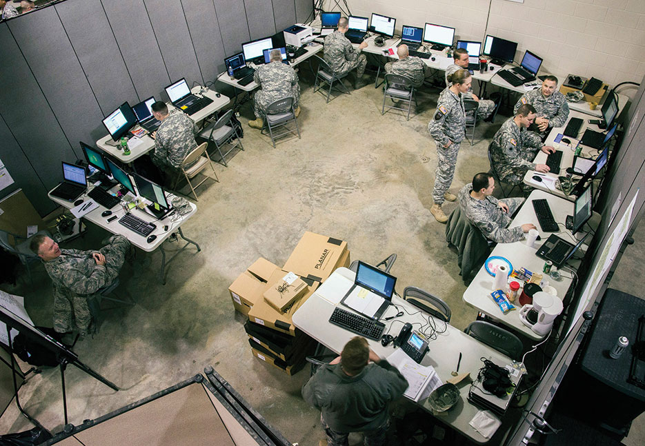 Ohio National Guard Computer Network Defense Team members conduct operations during Cyber Shield 2015, March 2015, at Camp Atterbury, IN (Ohio National Guard/George Davis)