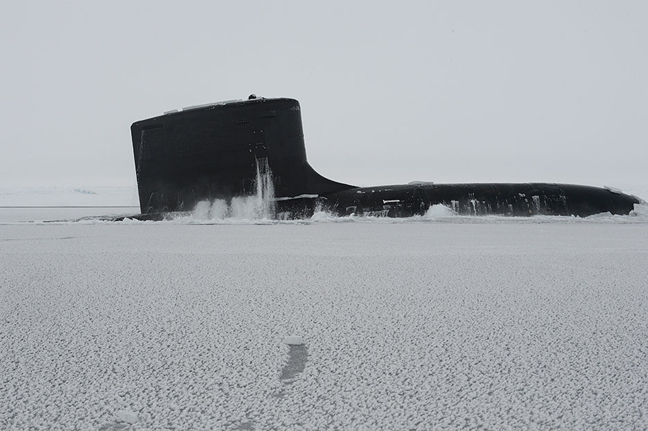 Attack submarine USS New Mexico surfaces at Ice Camp Nautilus in Arctic Ocean during Ice Exercise 2014 (DOD/Joshua Davies)