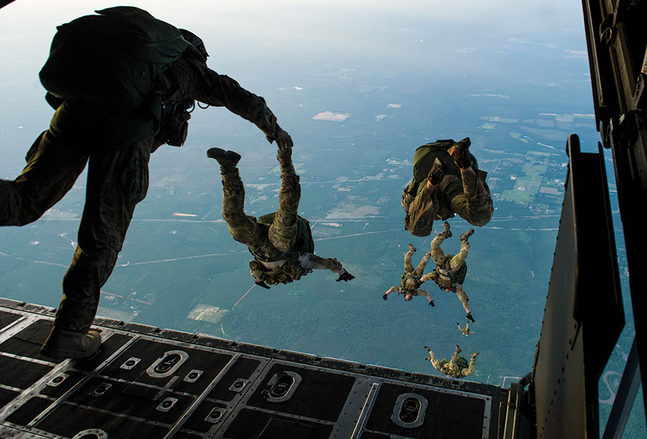 Airmen of 22nd special tactics squadron jump from MC-130H Combat Talon II during Emerald Warrior, DOD’s only irregular warfare exercise (U.S. Air Force/Marleah Miller)