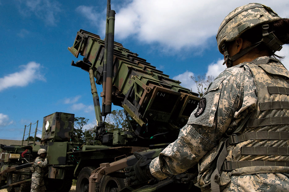 U.S. Soldiers perform pre-launch checks on Patriot missile launcher as part of field training exercise on Kadena Air Base, Japan (U.S. Air Force/Maeson Elleman)