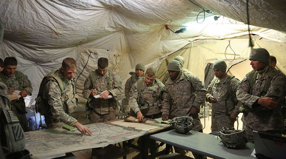 Soldiers plan for defense during decisive action rotation 15-02 at National Training Center on Fort Irwin, California, November 2014 (U.S. Army/Randis Monroe)