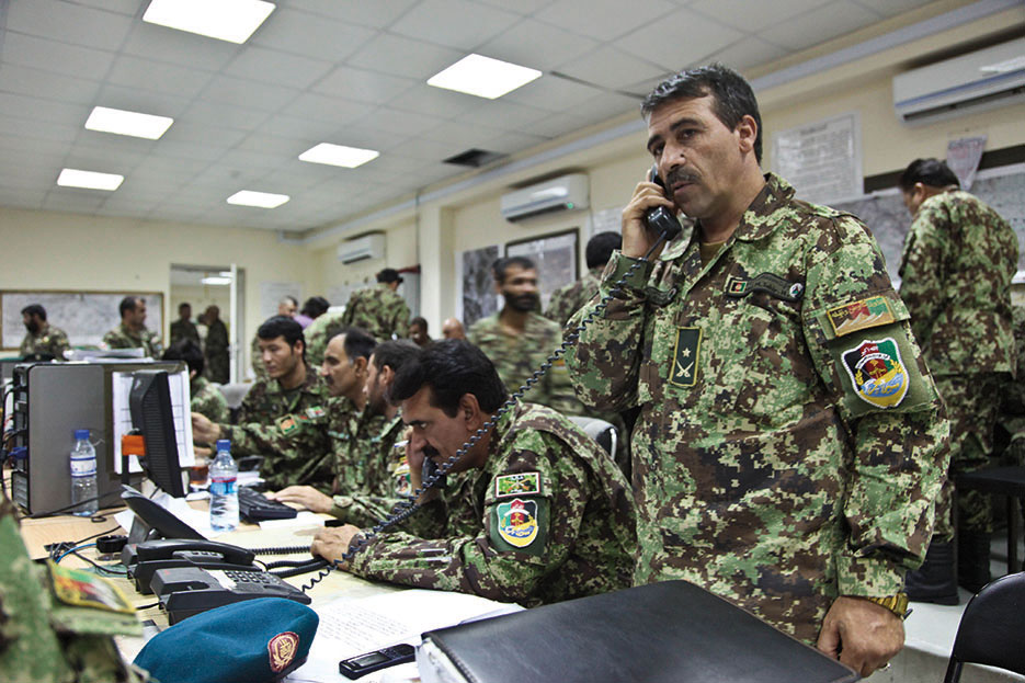 Afghan National Army soldiers wait for updates during runoff elections at Forward Operating Base Gamberi, Laghman Province, Afghanistan, June 14, 2014 (U.S. Army/Dixie Rae Liwanag)