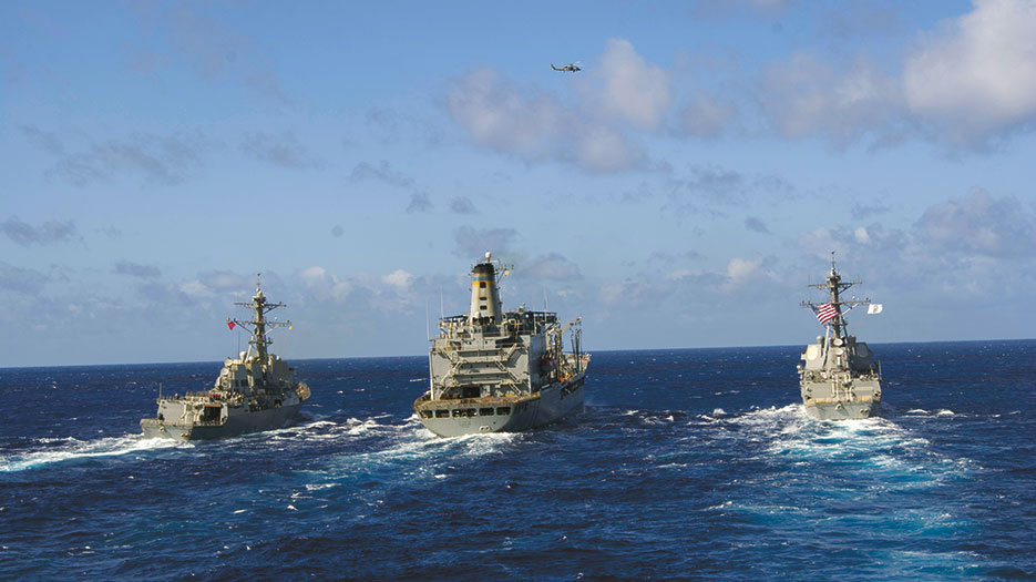 Ticonderoga-class Aegis guided-missile cruiser USS Chosin sails behind USS Chafee, USNS Guadalupe, and USS Preble for photo exercise at sea, February 13, 2015 (U.S. Navy/Andrew Albin)