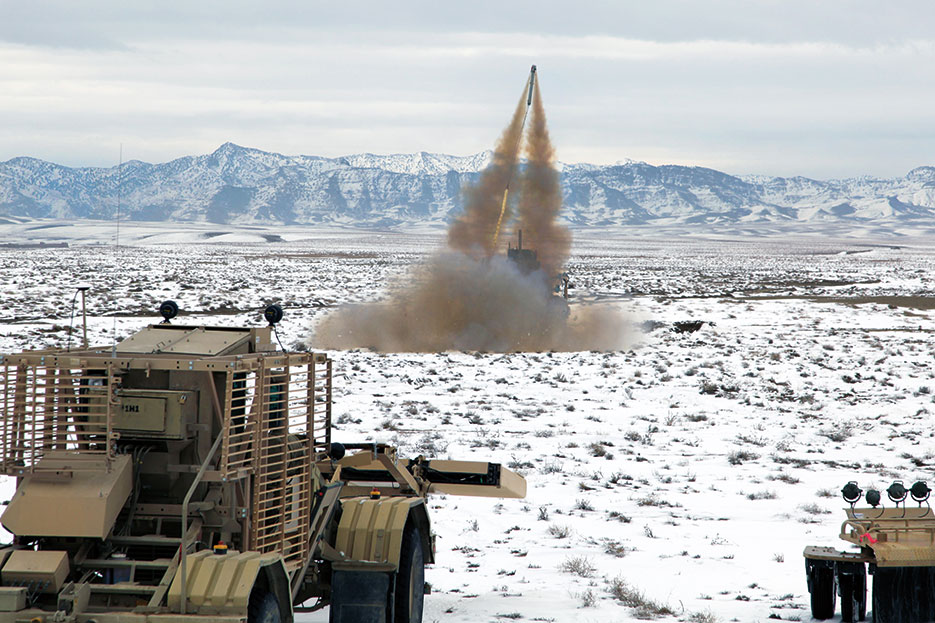 Mine clearing line explosive charge launches from Company A, 4th Brigade Special Troops Battalion, 4th Brigade Combat Team, 101st Airborne Division vehicle on Route Dodge, Paktika Province, Afghanistan (U.S. Army/Zachary Burke)