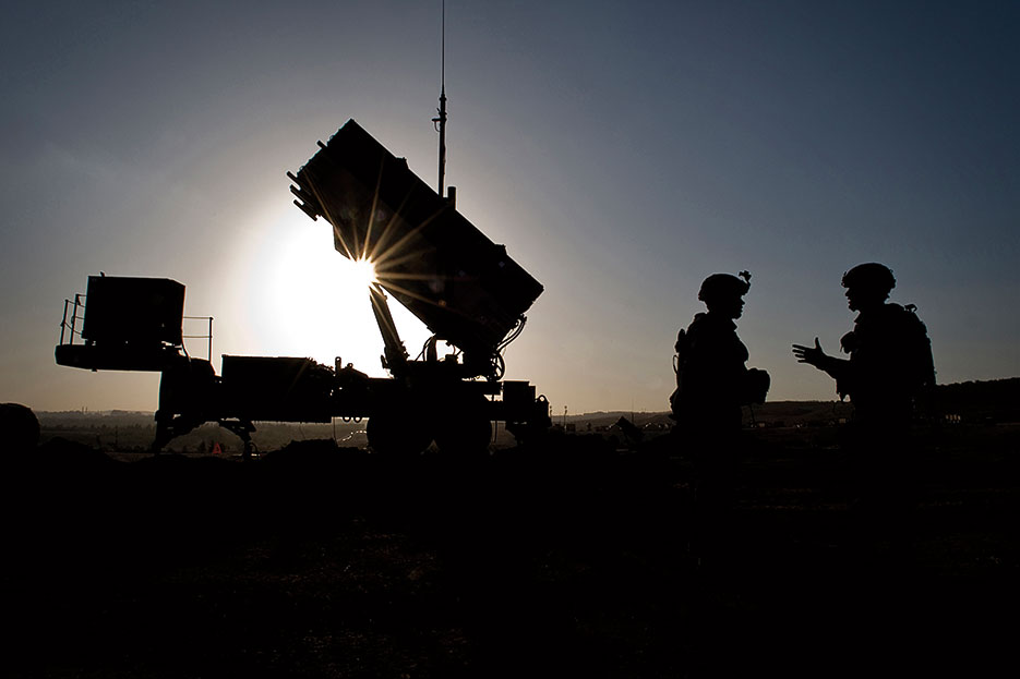U.S. Soldiers with 3rd Battalion, 2nd Air Defense Artillery Regiment, talk after routine inspection of Patriot missile battery at Turkish military base in Gaziantep, Turkey, February 26, 2013 (DOD/Sean M. Worrell)