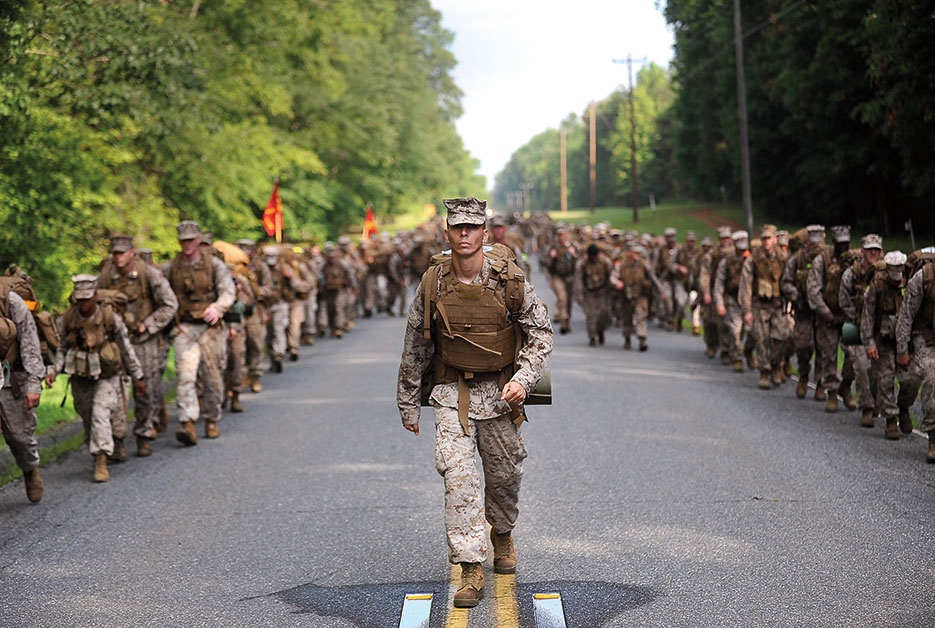 Marine supervises The Basic School permanent personnel battalion during 10-mile hike aboard west side of Marine Corps Base Quantico, Virginia, June 2013 (U.S. Marine Corps/Cuong Le)