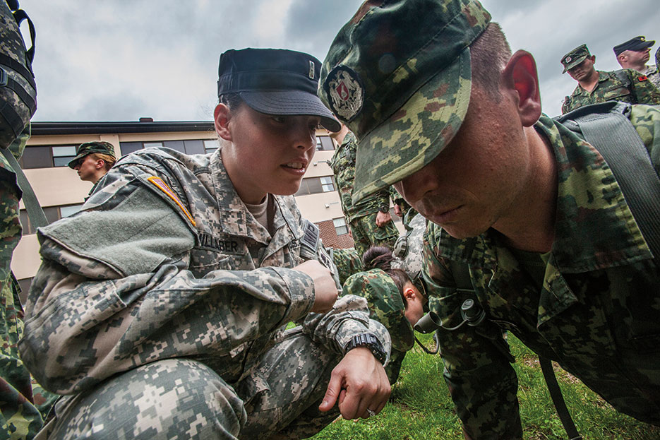 Drill instructor with New Jersey Army National Guard corrects Albanian officer candidate during 12-week Officer Candidate School program modeled after Active-duty program at Fort Benning, Georgia (DOD/Mark C. Olsen)