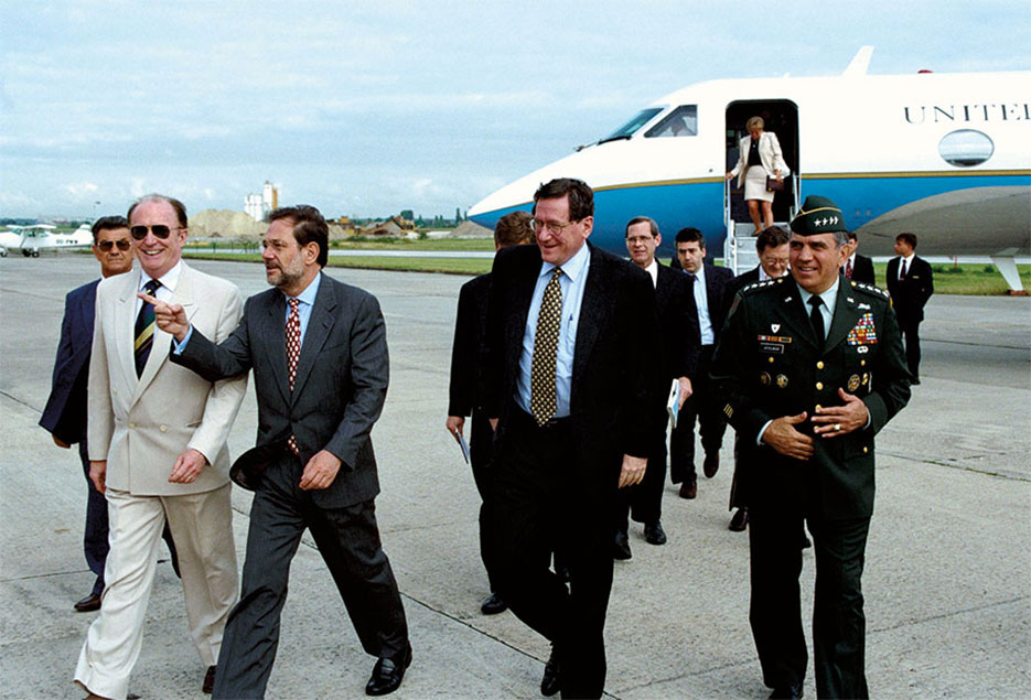 NATO Secretary General Javier Solana and General George Joulwan meet at Brussels airport with Richard Holbrooke en route for Bosnia as Special Envoy for President Clinton (NATO)