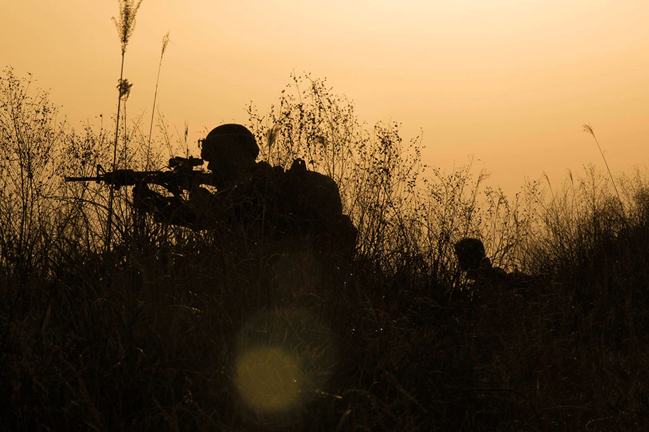 Marines post security on patrol during Forest Light 15-1 at Oyanohara Training Area in Yamato, Kumamoto Prefecture, Japan (U.S. Marine Corps/Warren Peace)