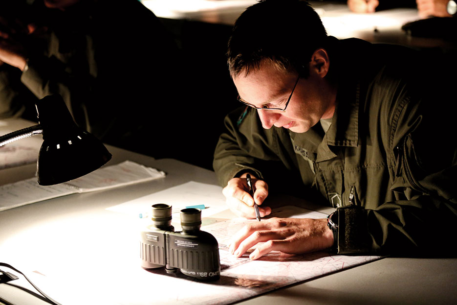 Austrian soldier plots points on map during exercise Combined Resolve II at Joint Multinational Readiness Center in Hohenfels, Germany, May 14, 2014 (DOD/Justin De Hoyos)