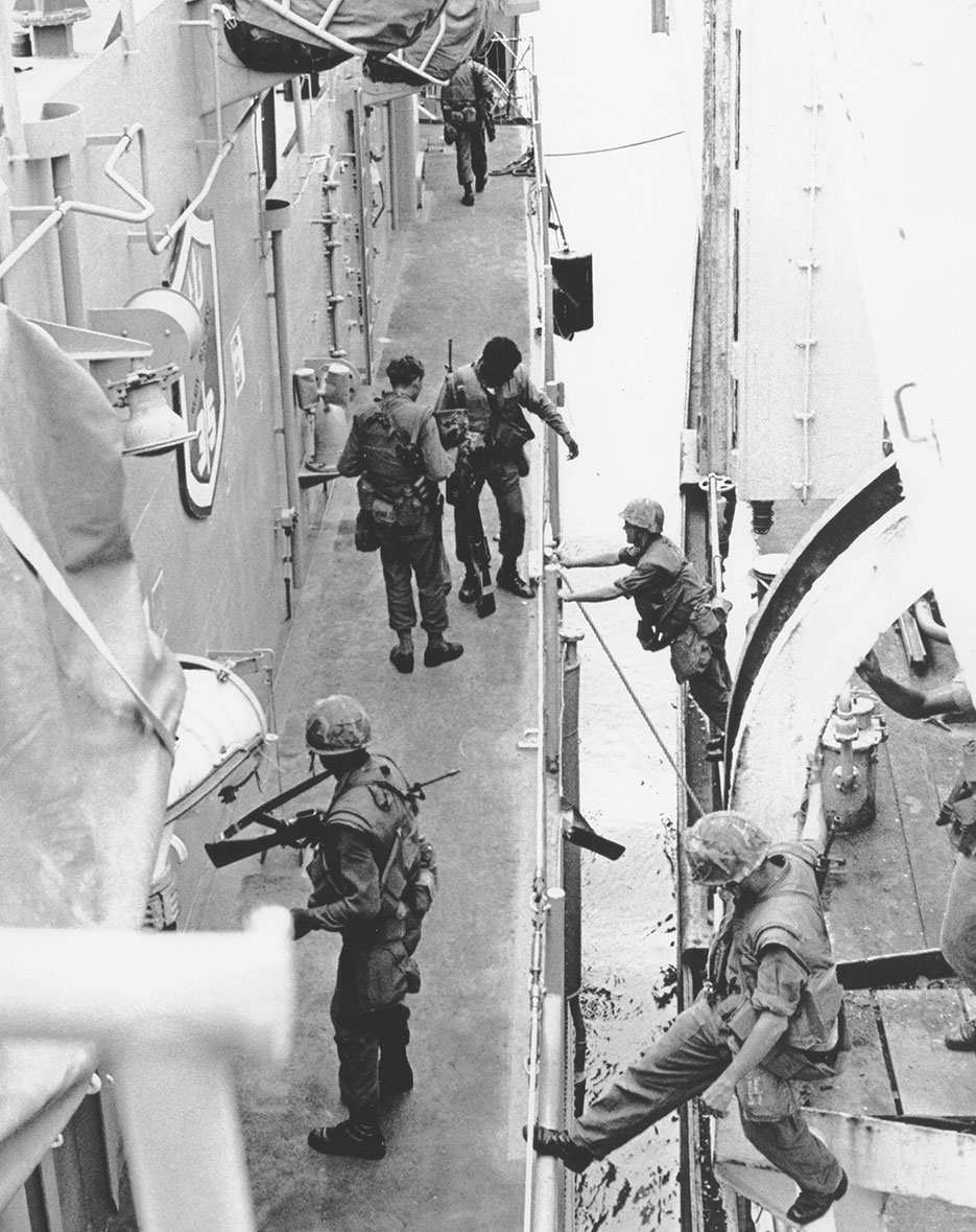 Marines reboard USS Harold E. Holt (DE-1974) from SS Mayaguez after merchant ship’s recovery, Koh Tang Island, Cambodia, May 14, 1975 (DOD/Michael Chan)