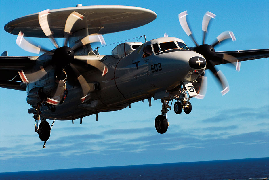 U.S. Navy E-2C Hawkeye 2000 aircraft assigned to “Wallbangers” of Carrier Airborne Early Warning Squadron 117 approaches flight deck of USS John C. Stennis while ship is underway in Pacific Ocean, July 13, 2006 (DOD/John Hyde)