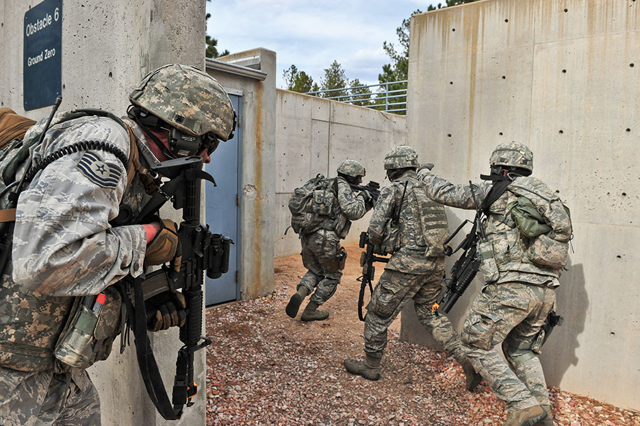 Air Force Reserve security forces members participate in 6-day combat leaders course while living in field conditions, placing practical application of combat maneuvers into complex mission environments (U.S. Air Force/Nicholas B. Ontiveros)