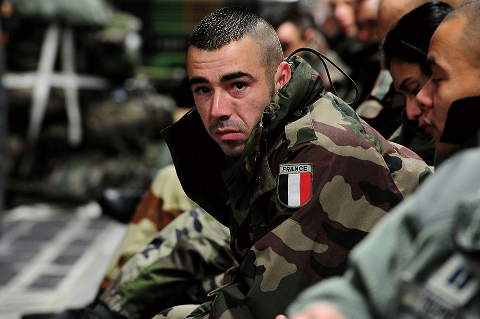 French soldier sits aboard U.S. Air Force C-17 Globemaster III en route to Mali, where French forces were fighting extremists who took control of much of north of country, January 20, 2013 (U.S. Air Force/Nathanael Callon)