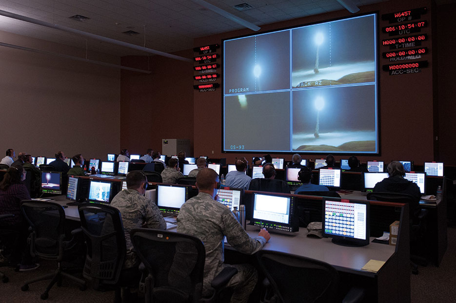 Members of 576th Flight Test Squadron monitor operational test launch of unarmed Minuteman III missile, March 27, 2015, at Vandenberg Air Force Base, California (DOD/Michael Peterson)